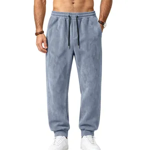 Soft suede-like texture detail of men's casual drawstring sweatpants with elastic waist.