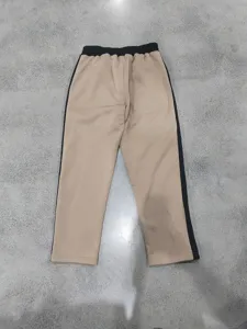 Detailed view of heavyweight fleece-lined casual sweatpants with contrast side stripes.