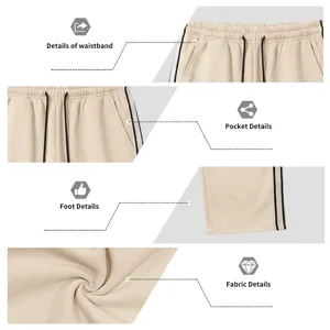 Nahaufnahmen von Herren gefütterten Jogginghosen mit elastischem Bund und Seitenstreifen.