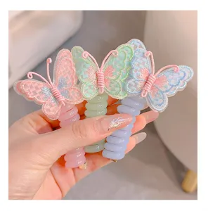 Kids telephone wire hair ties with cute embroidered butterflies, colorful toddler hair accessories.