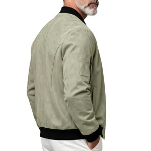 Detail view of the sage faux suede bomber jacket showing rib knit collar and sleeve pocket.