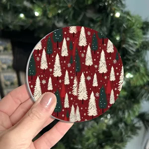 Close-up view of the Christmas tree pattern ceramic coaster, festive table decor detail.