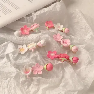 Cute cherry blossom hair clips, sweet pink floral side clips for daily styling.