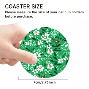 Dettaglio sottobicchiere auto con diametro di 7cm e motivo floreale verde per supporto.