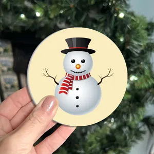 Cartoon snowman silicone coaster ideal for holiday table decoration and everyday cup protection.