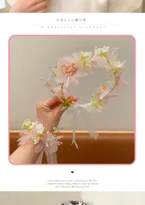 Handmade floral hair wreath and wrist flower set for girls, featuring pearls and soft pink flowers.