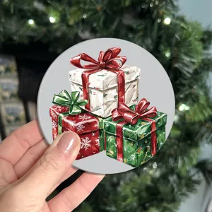 Christmas gift boxes round coffee coaster detail view, festive holiday table decor accessory.