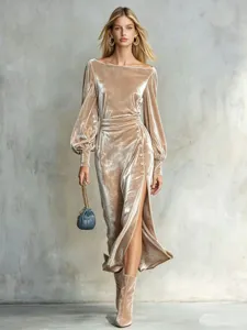 Exquisite velvet long sleeve detail with chic side slit and button accents for elegance.
