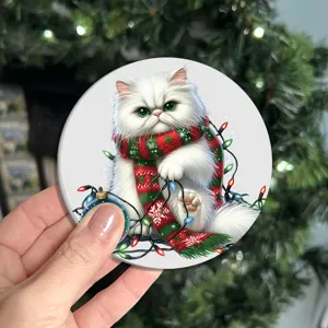 Christmas cat design ceramic coaster detail view, festive winter holiday home table decor item.
