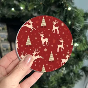 Christmas round coaster with cute reindeer tree pattern for festive holiday table decor detail