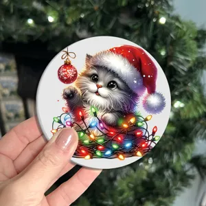 Cute Christmas kitten round coaster with colorful lights design, perfect festive home decoration.