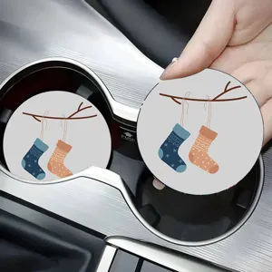 Round car cup coaster with cute Christmas stocking illustration, non-slip car interior detail.