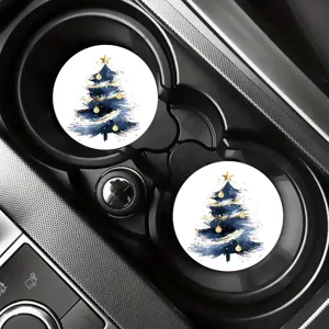 Detail view of round car cup coasters with elegant blue watercolor Christmas tree.