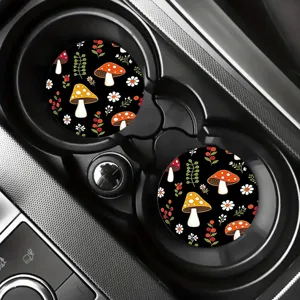 Whimsical mushroom patterned car cup coasters set, non-slip silicone beverage mats for auto interior.