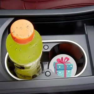 Detail view of a cute cartoon gift box car cup coaster, soft rubber anti-slip mat.