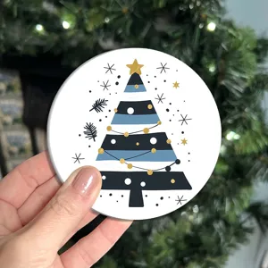 Close-up detail of a round cute Christmas tree pattern car coaster, nice festive holiday decor.