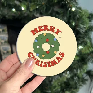 Round Christmas tree wreath pattern coaster detail view, festive holiday table decoration