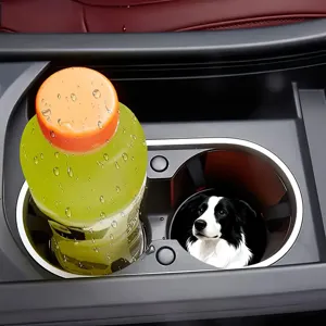 Silicone car cup holder coaster, non-slip drink mat with cute dog design for auto interior.