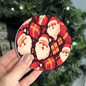 Christmas silicone coaster with cute Santa and gift pattern, perfect for holiday home decor.