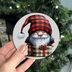Close-up detail of a round Christmas gnome diamond painting coaster with plaid gift box.