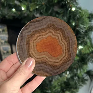 Round silicone coffee cup coaster featuring brown agate texture, heat-resistant and non-slip.