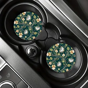 Set of two decorative retro botanical floral pattern car cup coasters for interior decoration.