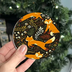 Silicone coaster with cute orange fox and botanical pattern, ideal for coffee and water cups.