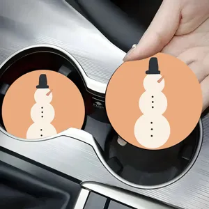 Close-up detail of the cute cartoon snowman car cup coaster, anti-slip interior decor pad.