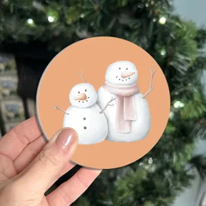 Cute Christmas snowman car coaster, non-slip round cup mat for auto interior decor.