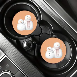Cute snowman print car coasters set, non-slip silicone cup mats for auto interior decor.