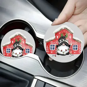 Close up of Christmas gnome car coaster, festive red house pattern, interior car cup holder.