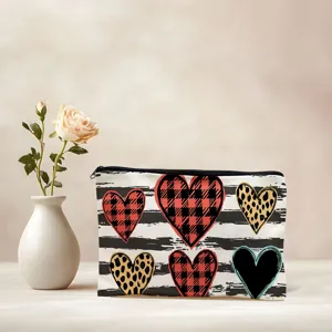 Detailed close-up view of the stylish cosmetic zipper pouch featuring lovely heart prints.