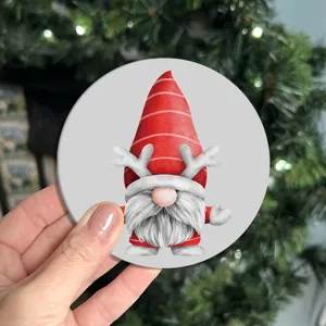 Close-up detail shot of a festive Christmas gnome diamond painting coaster with cute reindeer antlers.