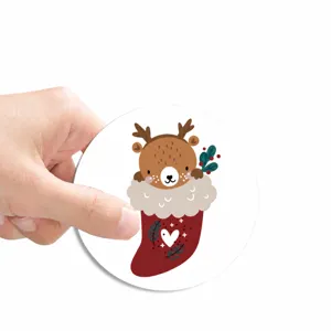 Vista dettagliata del sottobicchiere auto, simpatico motivo di cervo di Natale, diametro 7 cm