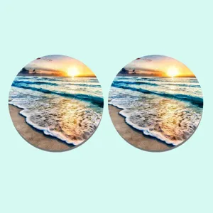 Set de dessous de verre ronds avec impression de coucher de soleil sur la plage de mer.