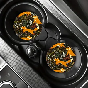 Silicone car cup coasters featuring a cute orange fox and botanical floral pattern detail shot.