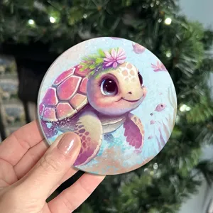 Cute cartoon sea turtle silicone coaster with flower crown, colorful animal coffee cup mat.