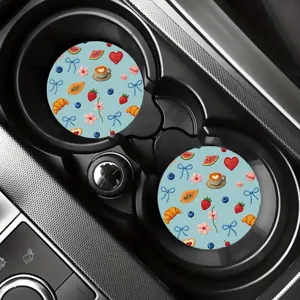 Bonito juego de posavasos azules para coche con simpáticos motivos de comida, antideslizantes.
