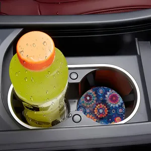 Detailed view of colorful mandala pattern absorbent car cup coaster placed in vehicle holder.