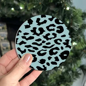 Round silicone coffee cup coaster with blue black leopard print heat insulation anti slip mat