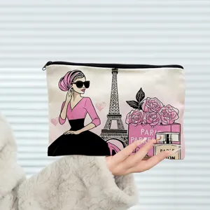 Canvas cosmetic pouch detail view, featuring stylish Parisian fashion print and zipper.