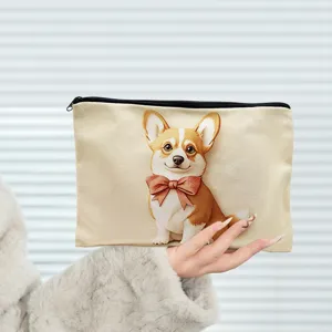 Close-up view of cute corgi print canvas zipper pouch, detailed cosmetic bag texture.