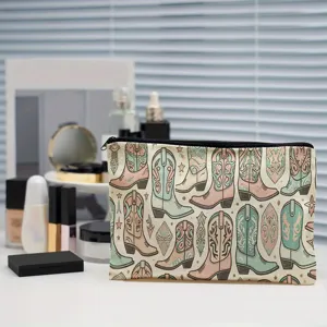 Detailansicht einer Kosmetiktasche mit Retro Western Cowboy Boots Muster und Reißverschluss.