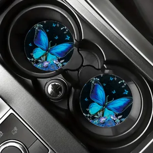 Vista dettagliata dei sottobicchieri auto in silicone con farfalla blu nel portaoggetti.