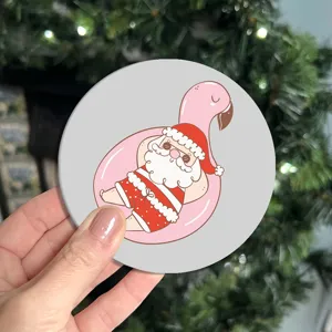 Close-up detail shot of a cute Christmas Santa flamingo car cup coaster with a festive holiday vibe.
