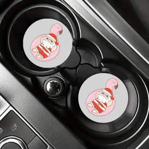 Car cup holder coaster detail showcasing cute Santa Claus design for automotive interior.