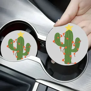 Closeup detail view of cartoon cactus print car cup coaster showing festive design and use.