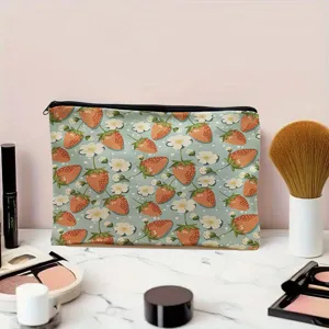 Cute strawberry printed cosmetic bag detail view, portable zipper makeup storage pouch.