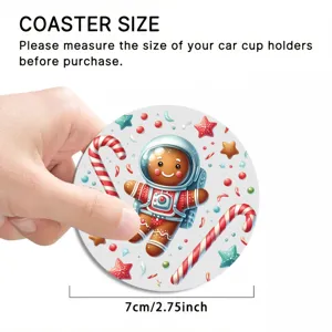 Gingerbread astronaut car coaster detail view, showing 7cm size and festive holiday design.