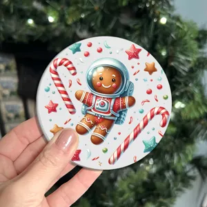 Close-up detail view of the cute Christmas astronaut gingerbread man car cup coaster pattern.